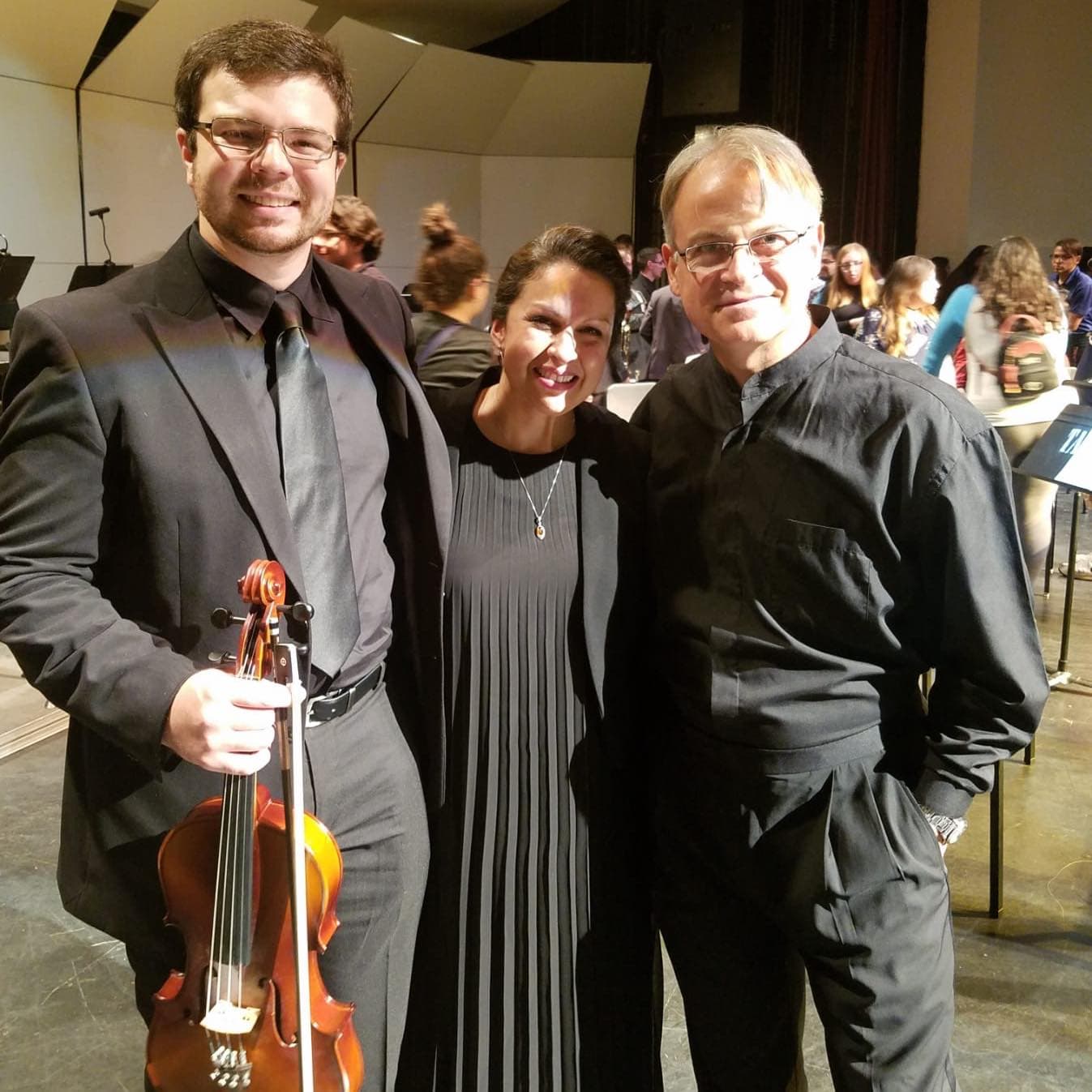 Ryan Henry as instrumentalist with violin